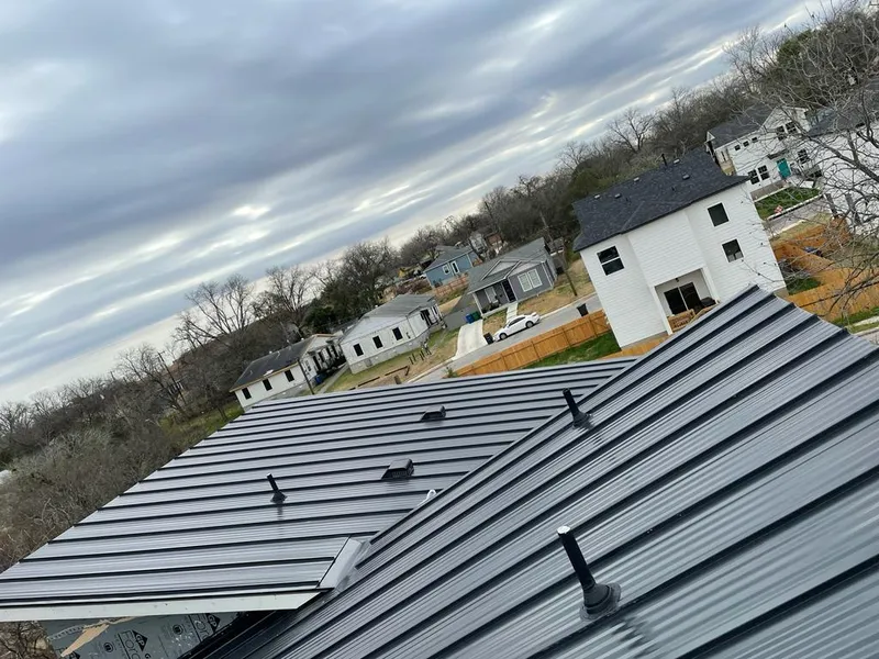 Standing seam metal roof panels with vents for Skylight Repair in Haltom City